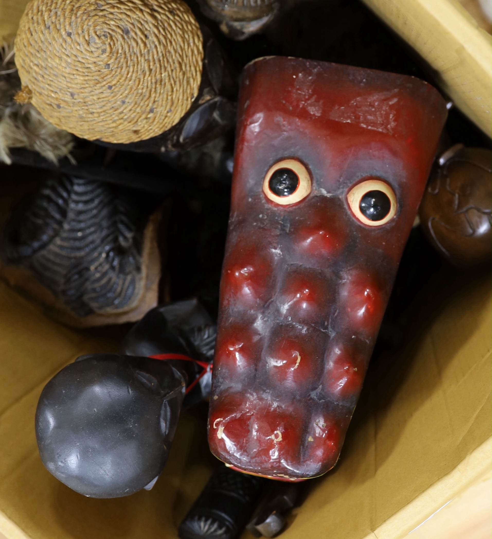 A large collection of various African carvings, masks etc